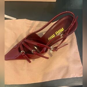Patent leather burgundy Miu Miu sling back heels